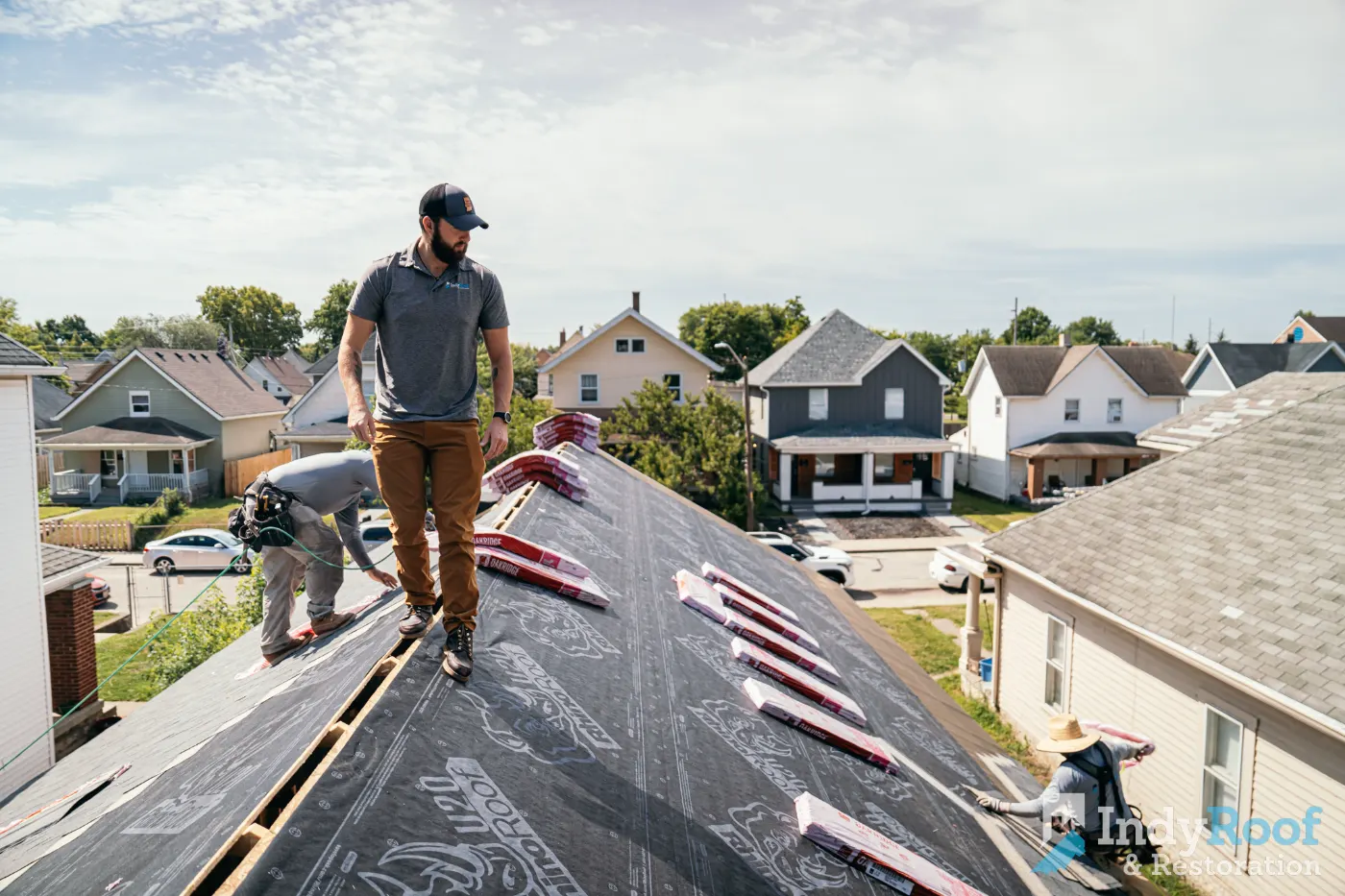 Tarping and dry-in on a Raintree Village commercial roof